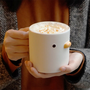 Sip with a Smile: Adorable Minimalistic Duck Ceramic Mug